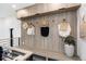 Entryway with wood paneling, hat racks, storage, and a modern bench with storage at 1544 S Fillmore St, Denver, CO 80210