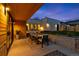 Inviting patio with outdoor dining, seating, and well-manicured landscaping at 1544 S Fillmore St, Denver, CO 80210