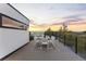 Rooftop deck offering outdoor dining with neighborhood views at 1544 S Fillmore St, Denver, CO 80210