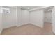 Carpeted bedroom with large closet and access to a laundry area at 2849 N Vine St, Denver, CO 80205