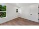 Bright bedroom with double windows and a closet, perfect for storage at 2849 N Vine St, Denver, CO 80205