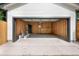 A clean and spacious garage with concrete floors and wood paneled walls at 2849 N Vine St, Denver, CO 80205