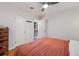 Inviting bedroom featuring a ceiling fan and easy access to other living spaces at 430 Osceola St, Denver, CO 80204