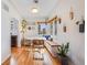 Charming breakfast nook featuring a built-in bench, plants, and ample natural light at 430 Osceola St, Denver, CO 80204