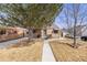 Inviting single-story home with a well-maintained front yard and classic design at 430 Osceola St, Denver, CO 80204