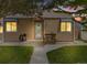 Charming home exterior with a well-manicured lawn, inviting front porch, and a beautifully maintained facade at 430 Osceola St, Denver, CO 80204