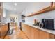 Bright kitchen featuring modern appliances, custom cabinets and hardwood flooring at 430 Osceola St, Denver, CO 80204