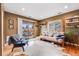 Comfortable living room featuring a sliding glass door to an outdoor patio at 430 Osceola St, Denver, CO 80204