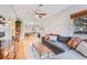 Spacious living room with an open floor plan, hardwood floors, and lots of natural light at 430 Osceola St, Denver, CO 80204