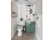 The remodeled bathroom offers a vanity with modern fixtures at 13040 W 63Rd Pl # C, Arvada, CO 80004