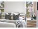 Bright bedroom with stylish decor and two bright windows at 13040 W 63Rd Pl # C, Arvada, CO 80004