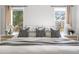 Bright bedroom with stylish decor and two bright windows at 13040 W 63Rd Pl # C, Arvada, CO 80004