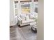 Cozy living room nook with bright windows and comfortable seating at 13040 W 63Rd Pl # C, Arvada, CO 80004