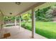 Back porch features a covered area with ample lighting and a view of the lovely backyard at 7719 S Jackson Cir, Centennial, CO 80122