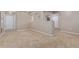 Large basement space with neutral carpet and paint offers versatility and room to spread out at 7719 S Jackson Cir, Centennial, CO 80122