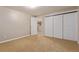 Basement bedroom offers ample closet space and new carpet at 7719 S Jackson Cir, Centennial, CO 80122