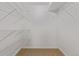 Walk-in closet featuring wire shelving and neutral carpeting at 7719 S Jackson Cir, Centennial, CO 80122