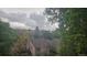 Backyard view from window surrounded by lots of trees and green space at 18531 E Tanforan Pl, Aurora, CO 80015