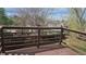 Wood deck with a brown wood railing and scenic views of the surrounding neighborhood at 18531 E Tanforan Pl, Aurora, CO 80015