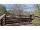 Wood deck with a brown wood railing and scenic views of the surrounding neighborhood at 18531 E Tanforan Pl, Aurora, CO 80015
