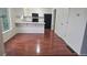 Modern kitchen with breakfast bar and stainless appliances at 18531 E Tanforan Pl, Aurora, CO 80015