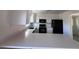 Bright kitchen with stainless steel appliances, white cabinets, and a breakfast bar at 18531 E Tanforan Pl, Aurora, CO 80015