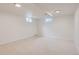Spacious basement featuring carpeted flooring, recessed lighting, and egress windows at 789 Hamal Dr, Lone Tree, CO 80124