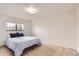 Simple bedroom with a bed, a window and neutral walls at 789 Hamal Dr, Lone Tree, CO 80124