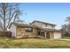 Charming two-story home with brick facade, well-maintained lawn, and attached two car garage on a sunny day at 789 Hamal Dr, Lone Tree, CO 80124