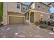 Charming two-story home featuring a spacious two-car garage and welcoming front porch at 6145 S Paris St, Greenwood Village, CO 80111