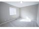 This neutral-colored bedroom provides ample space for relaxation and rest at 7243 S Old Hammer Ct, Aurora, CO 80016