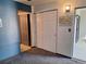 Bedroom showcasing closet doors with neutral carpet and decor at 3550 S Harlan St # 313, Denver, CO 80235