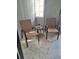 Enclosed patio with furniture, light brick wall and a sunny window at 3550 S Harlan St # 313, Denver, CO 80235