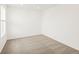 Bright bedroom features plush carpeting, neutral walls, and recessed lighting at 547 Homestead Ave, Brighton, CO 80601
