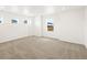 Bedroom featuring three windows, recessed lights, and neutral carpet at 547 Homestead Ave, Brighton, CO 80601