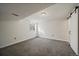 Unfinished basement with a sliding barn door at 8699 Garrison Ct, Arvada, CO 80005