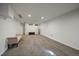 Unfinished basement with carpet flooring, a neutral bench, and a blank canvas for your creativity at 8699 Garrison Ct, Arvada, CO 80005