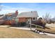 Charming single-Gathering home featuring a brick chimney and well-maintained landscaping in a desirable location at 8699 Garrison Ct, Arvada, CO 80005