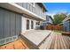 This patio has a concrete deck and a wooden deck at 8699 Garrison Ct, Arvada, CO 80005