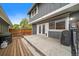 This patio features a concrete deck and a wooden deck at 8699 Garrison Ct, Arvada, CO 80005
