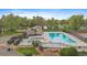 This community pool features a lake, play ground, and tennis courts at 8699 Garrison Ct, Arvada, CO 80005