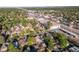 An aerial view of the neighborhood showcasing the home's proximity to shops and surrounding neighborhood at 1528 Holly St, Denver, CO 80220