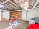 Finished basement space with a playful area and lots of room at 1528 Holly St, Denver, CO 80220
