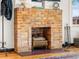 Charming brick fireplace in a cozy living space at 1528 Holly St, Denver, CO 80220