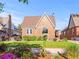 Charming brick home with manicured lawn and beautiful landscaping at 1528 Holly St, Denver, CO 80220