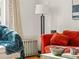 Cozy living room detail with plush seating and natural light at 1528 Holly St, Denver, CO 80220