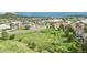 Aerial shot of townhomes near a green space with a view of a town in the background at 1464 Nemrick Pl, Castle Rock, CO 80109