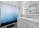 Clean bathroom featuring a vanity and decorative, marine-themed decor at 1464 Nemrick Pl, Castle Rock, CO 80109