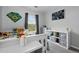 bedroom featuring a bed, storage shelves, and playful decor at 1464 Nemrick Pl, Castle Rock, CO 80109