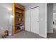 Bedroom with bookcase and large closet with sliding doors at 1464 Nemrick Pl, Castle Rock, CO 80109